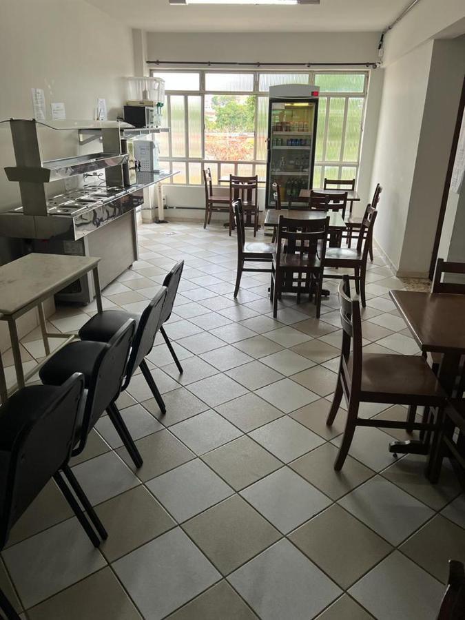 Premium Center Hotel Betim Bagian luar foto