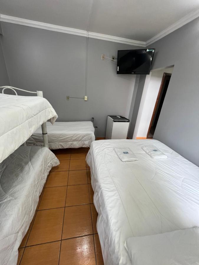 Premium Center Hotel Betim Bagian luar foto