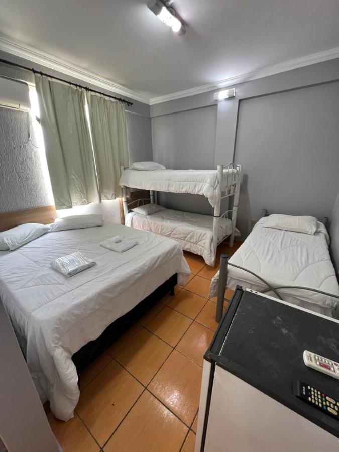 Premium Center Hotel Betim Bagian luar foto