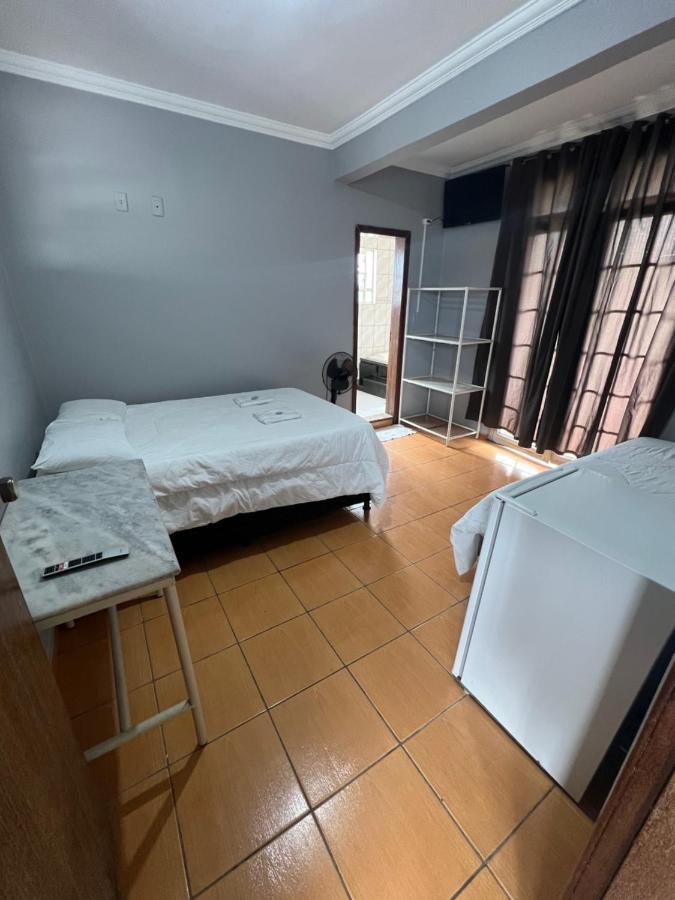Premium Center Hotel Betim Bagian luar foto