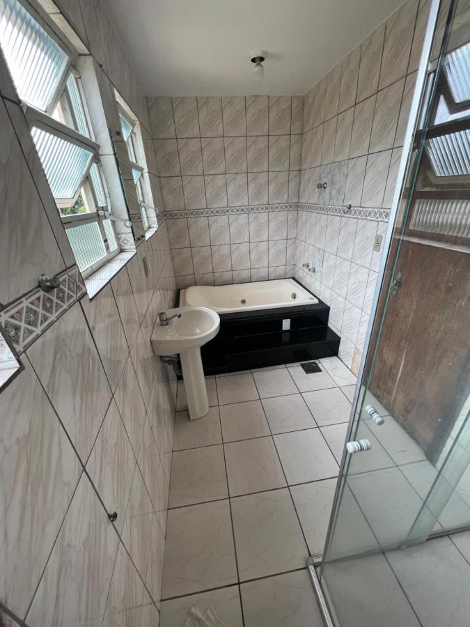 Premium Center Hotel Betim Bagian luar foto