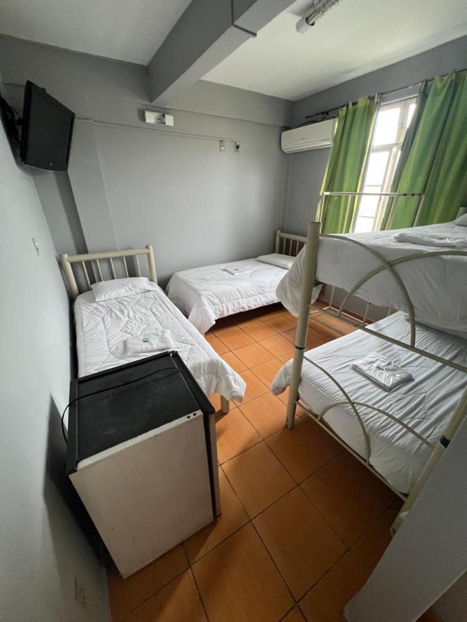 Premium Center Hotel Betim Bagian luar foto