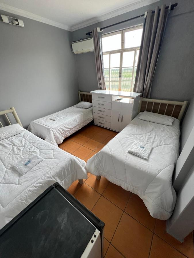 Premium Center Hotel Betim Bagian luar foto