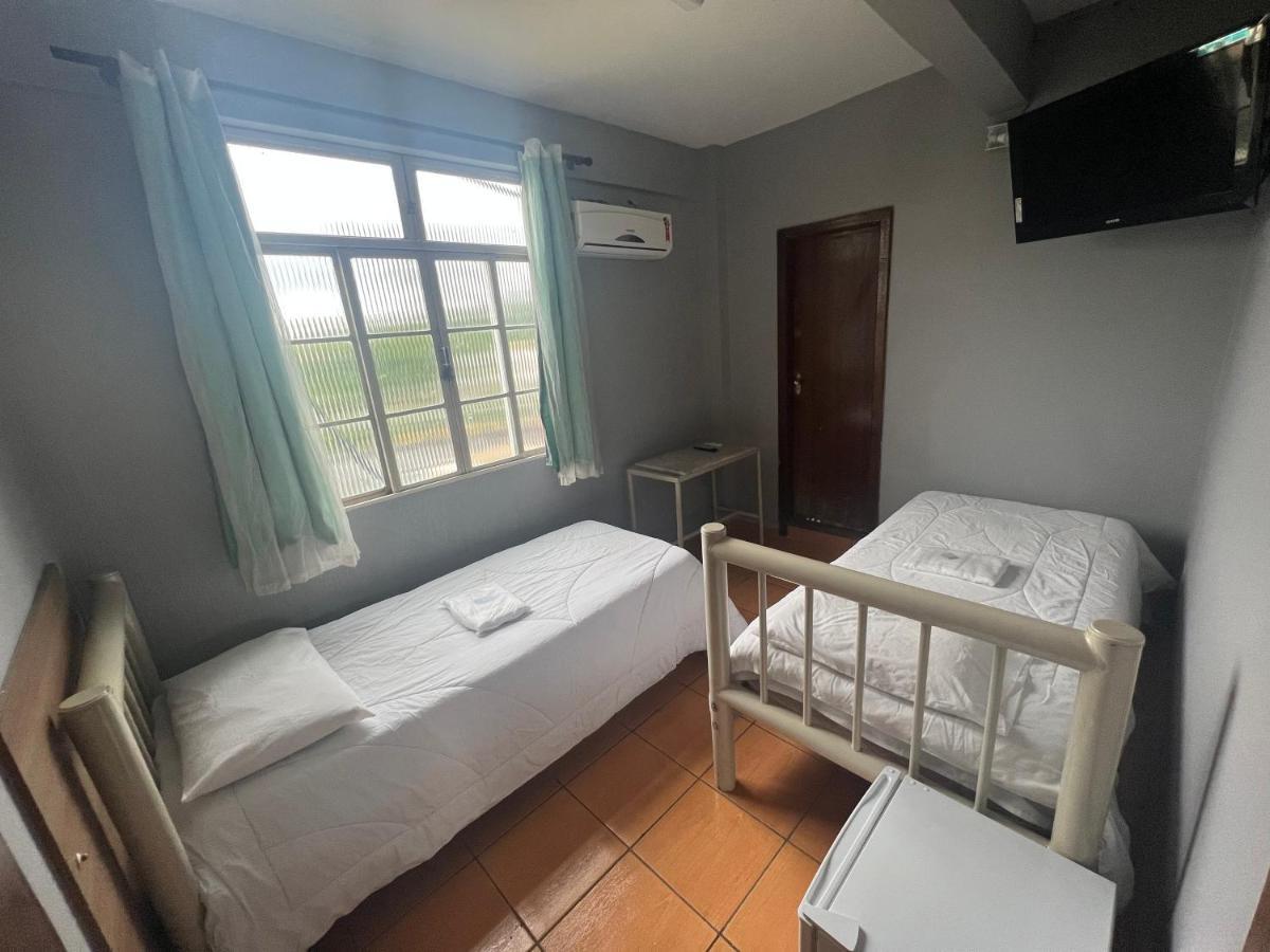 Premium Center Hotel Betim Bagian luar foto