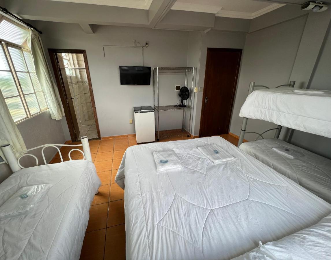 Premium Center Hotel Betim Bagian luar foto