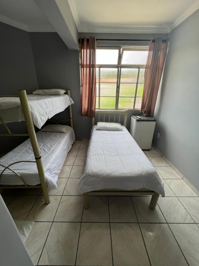 Premium Center Hotel Betim Bagian luar foto