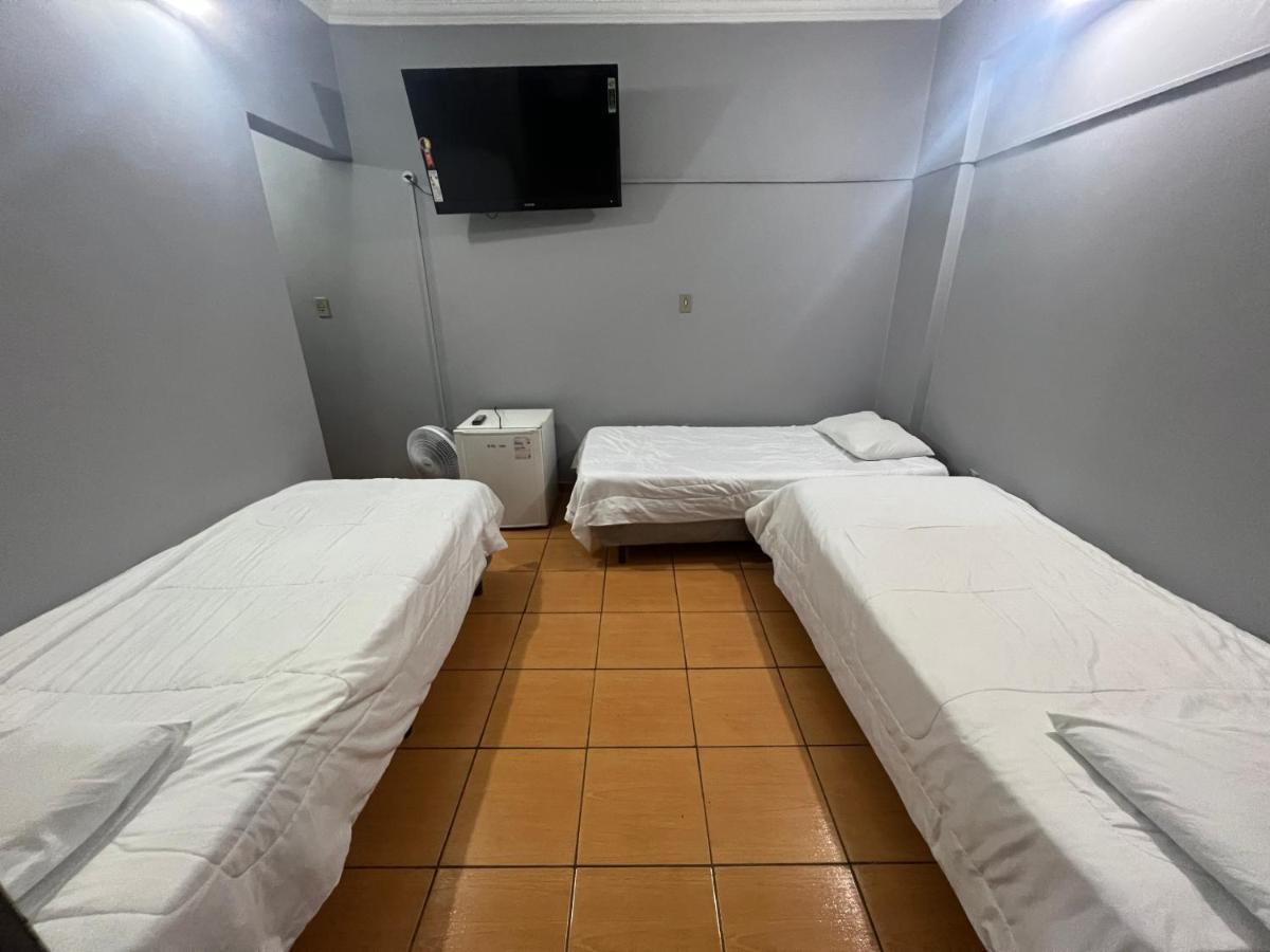 Premium Center Hotel Betim Bagian luar foto