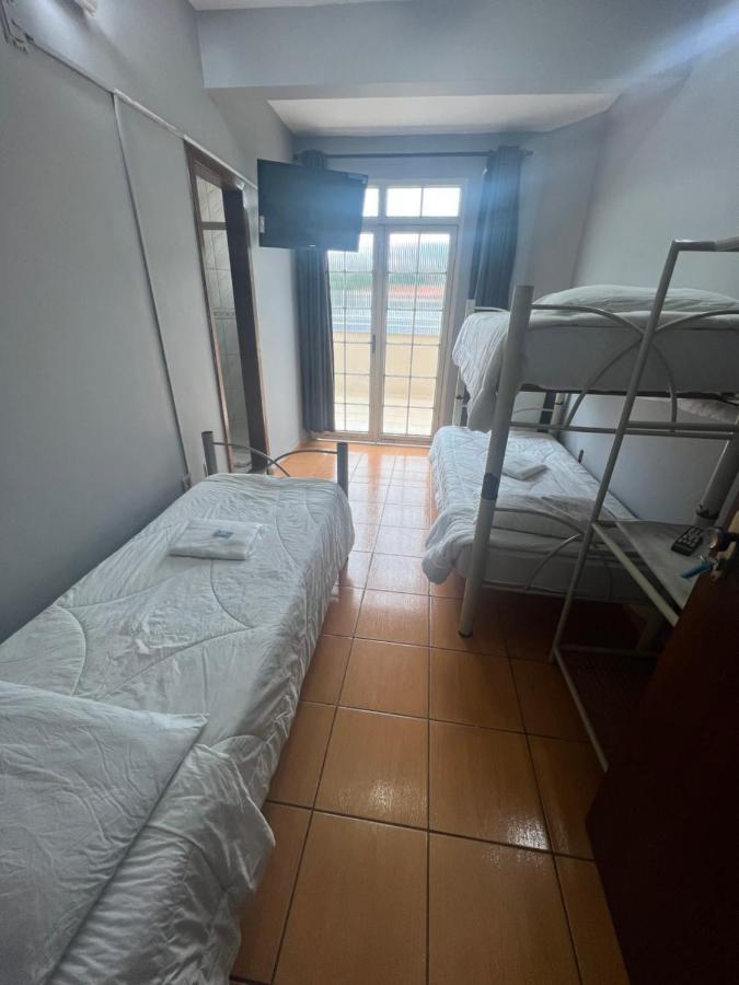 Premium Center Hotel Betim Bagian luar foto