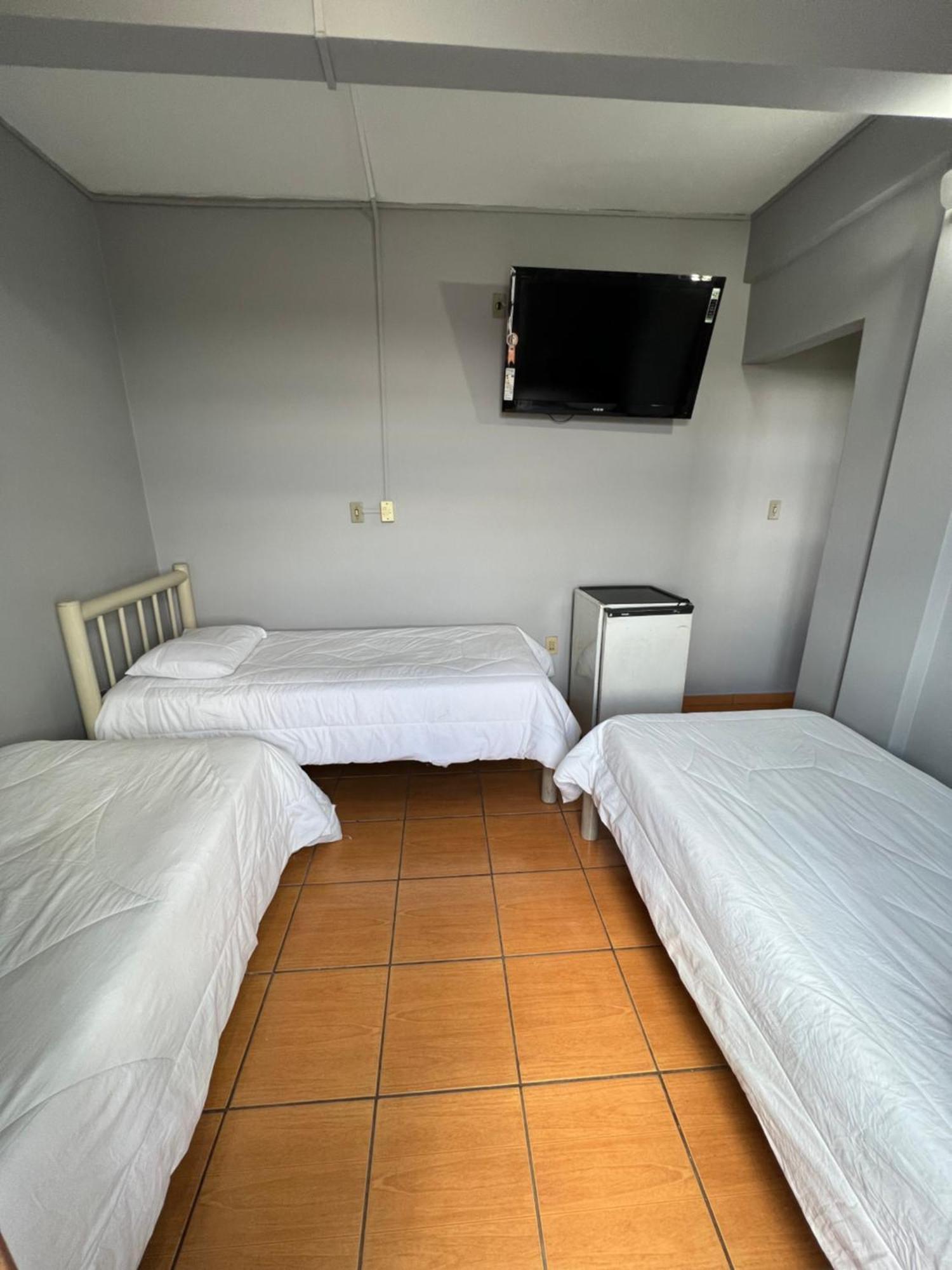 Premium Center Hotel Betim Bagian luar foto