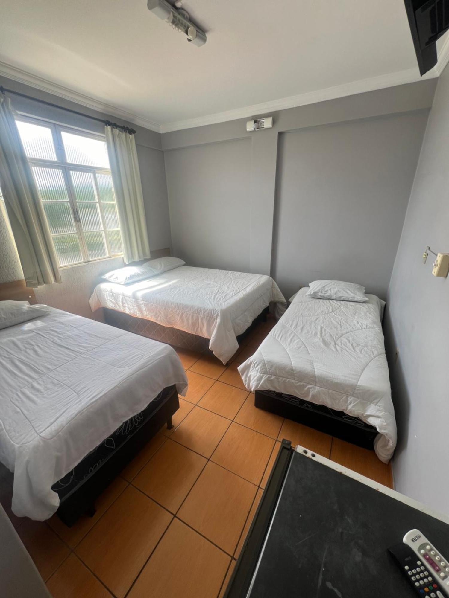 Premium Center Hotel Betim Bagian luar foto