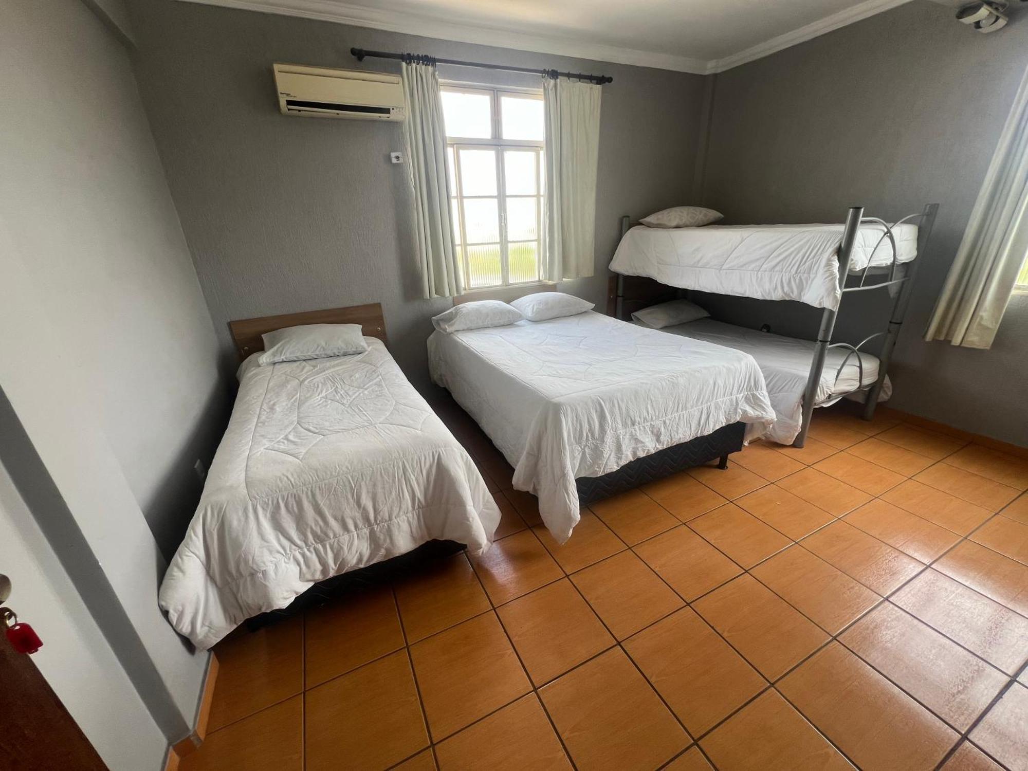 Premium Center Hotel Betim Bagian luar foto
