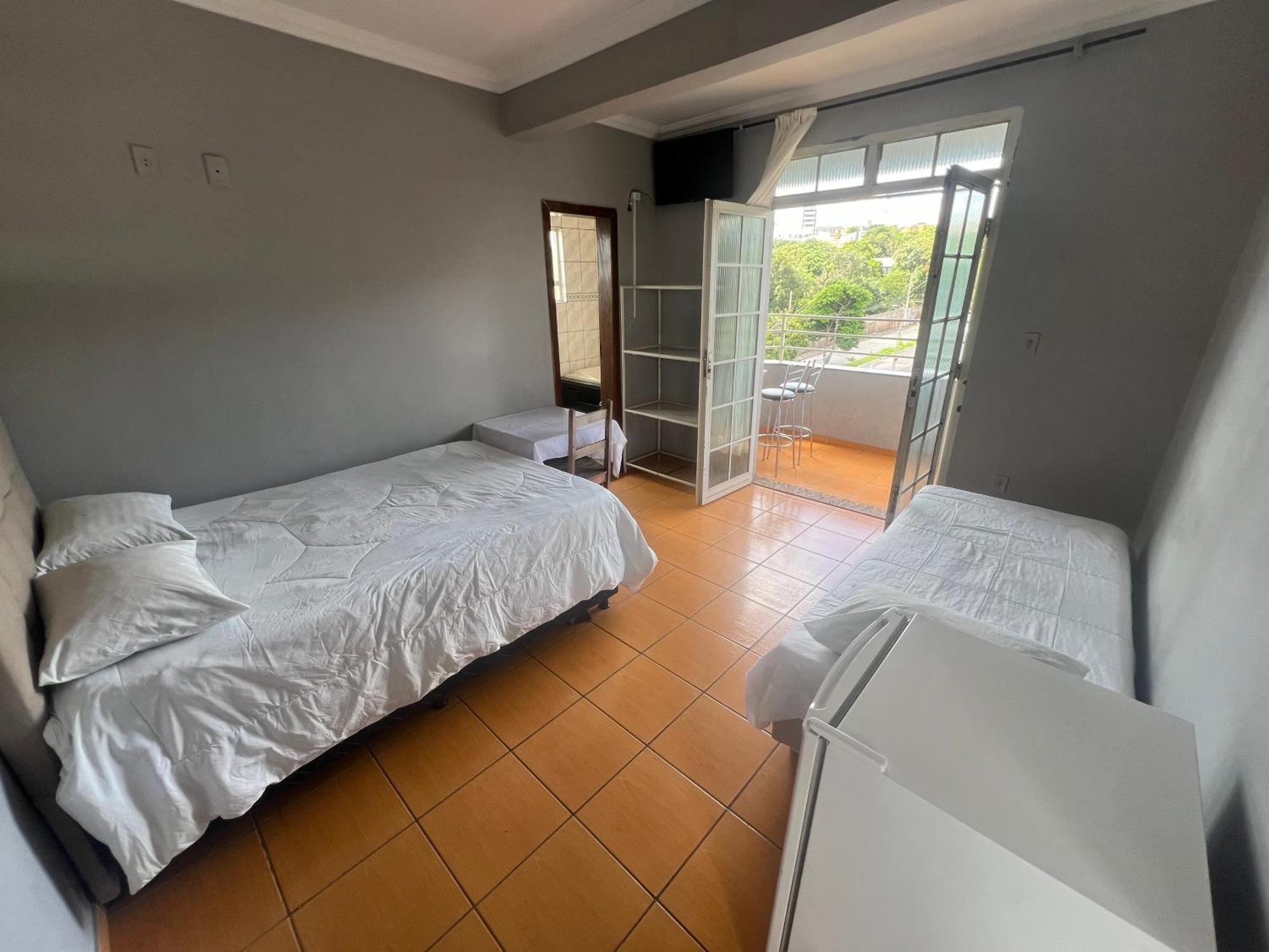 Premium Center Hotel Betim Bagian luar foto