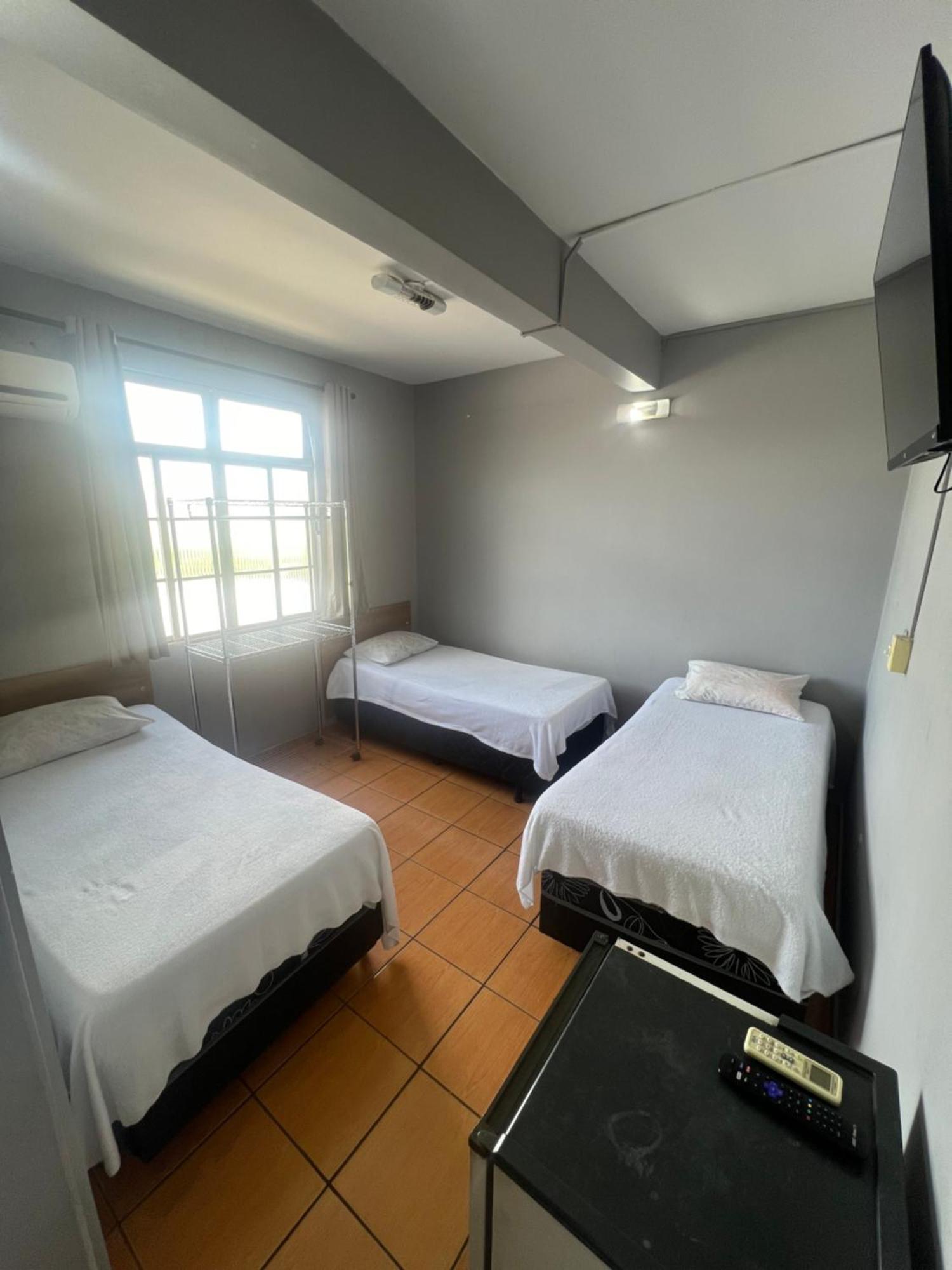 Premium Center Hotel Betim Bagian luar foto