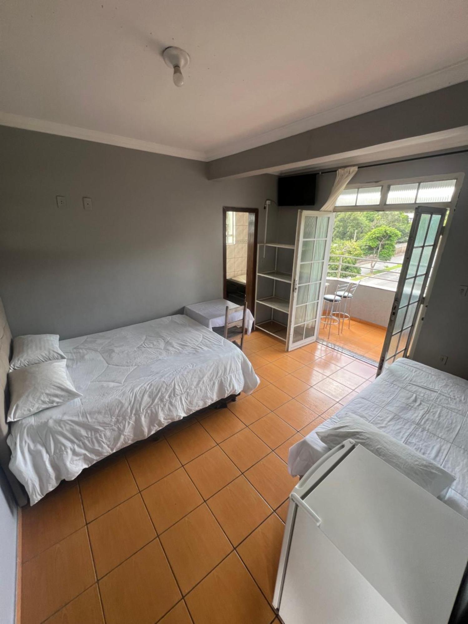 Premium Center Hotel Betim Bagian luar foto
