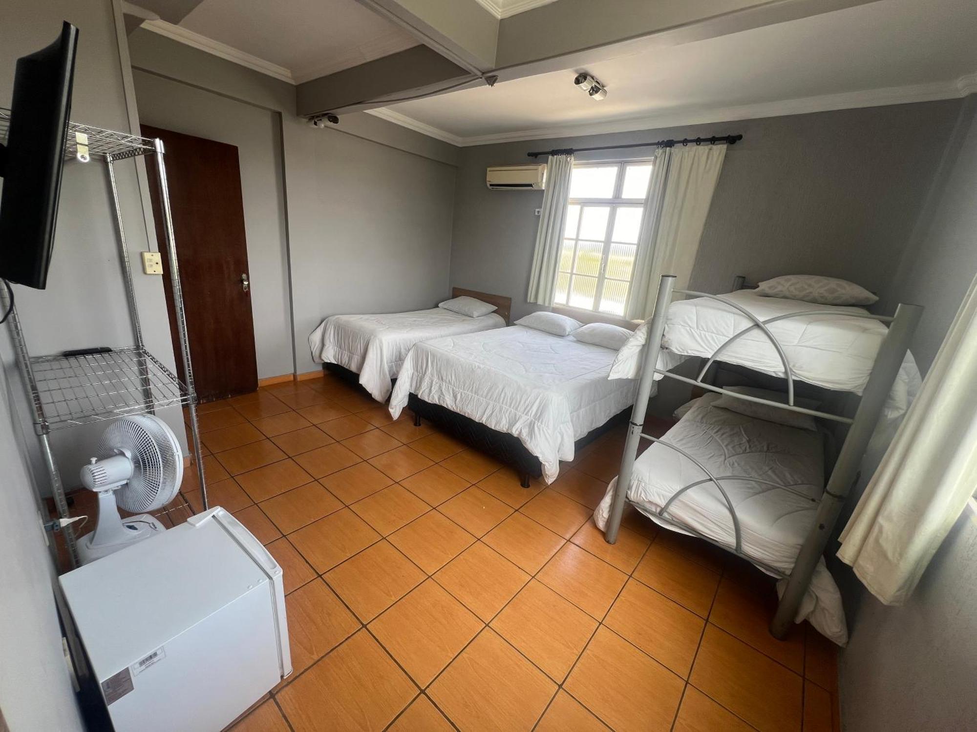 Premium Center Hotel Betim Bagian luar foto