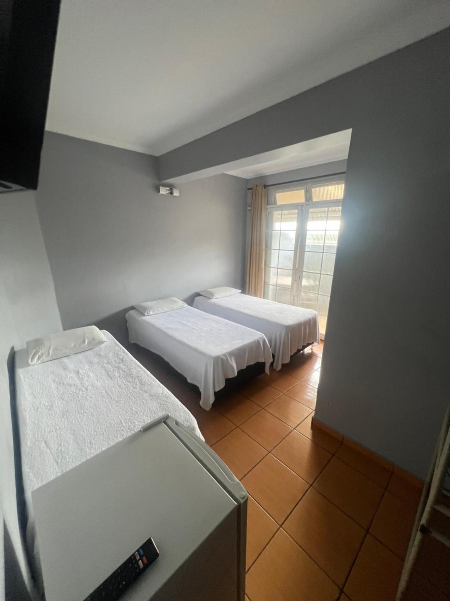 Premium Center Hotel Betim Bagian luar foto