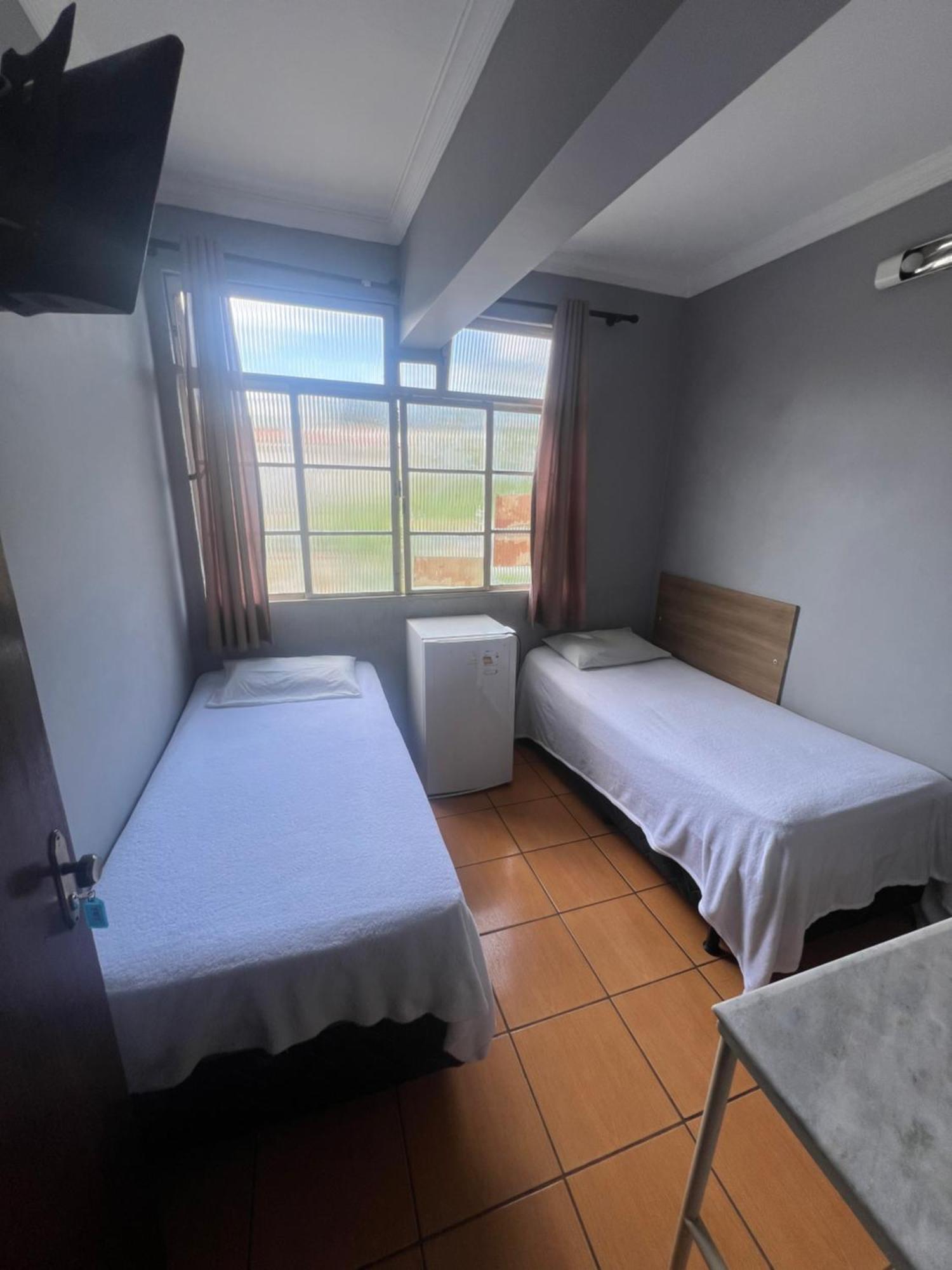Premium Center Hotel Betim Bagian luar foto
