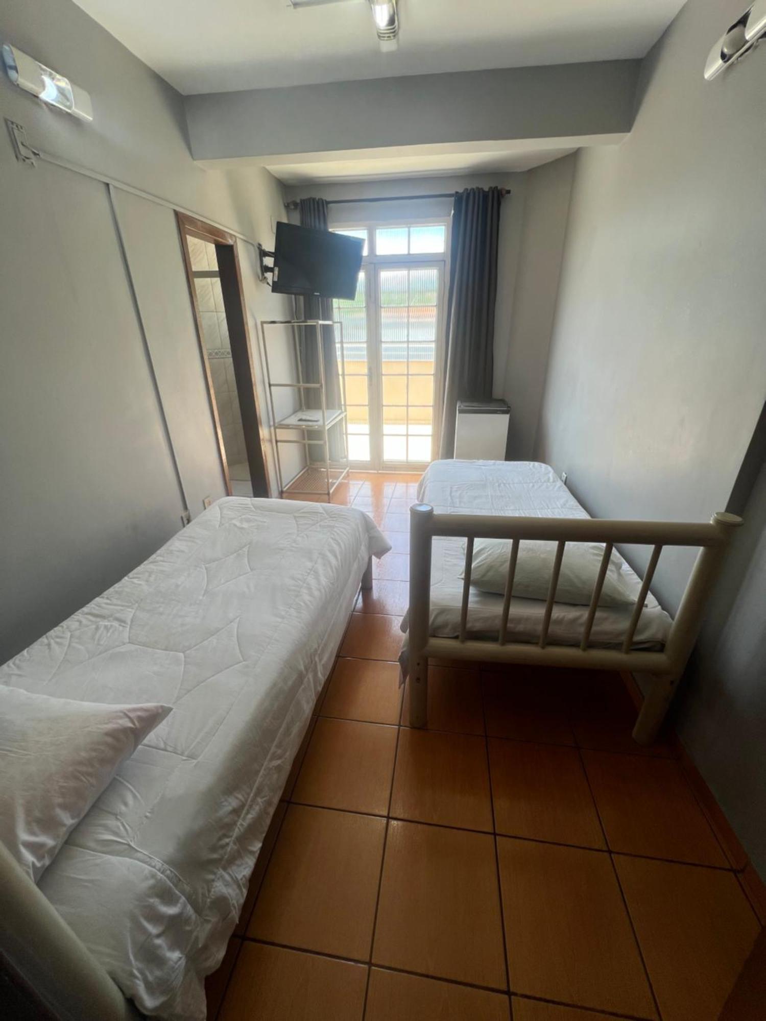 Premium Center Hotel Betim Bagian luar foto