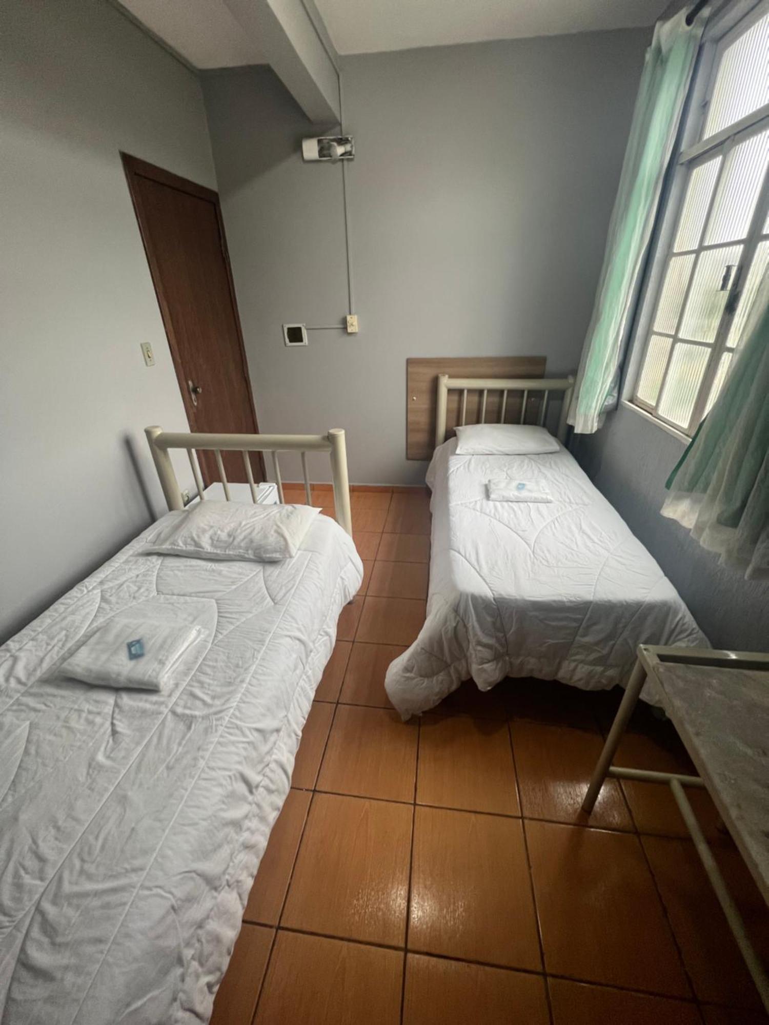 Premium Center Hotel Betim Bagian luar foto