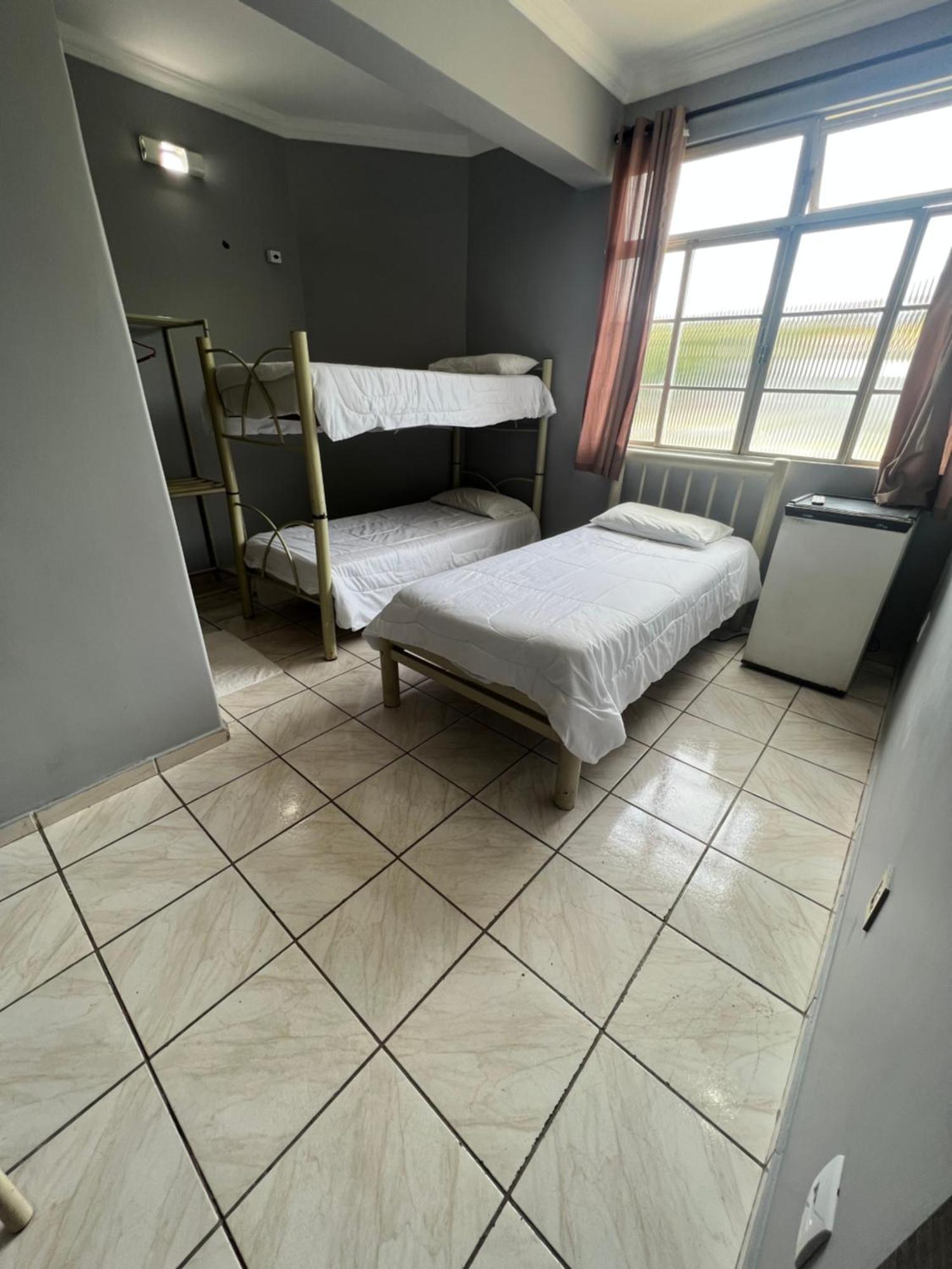 Premium Center Hotel Betim Bagian luar foto